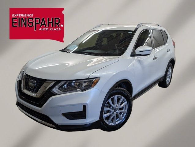 2018 Nissan Rogue SV in Pearl White — front three-quarter view